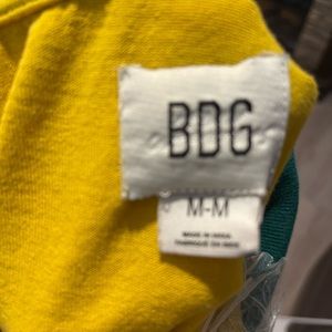 BDG crop polo shirt.  Size medium fun mushroom design.